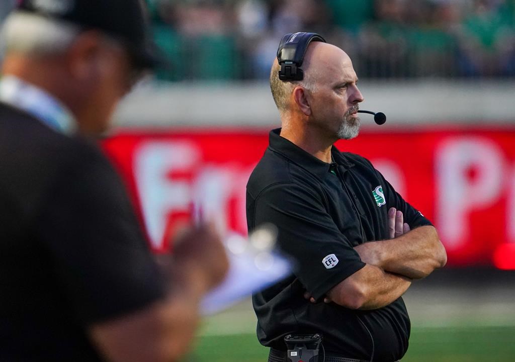 Craig Dickenson looks on during the second half of a CFL football game in 2023.