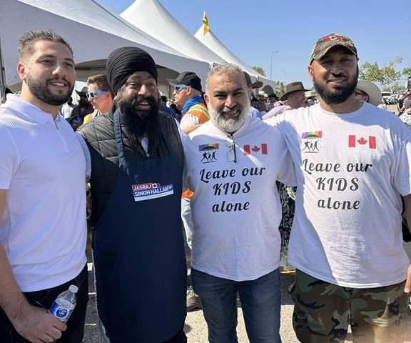 Mums the word as Polievre, Calgary MP stay silent over hate T-shirt photos