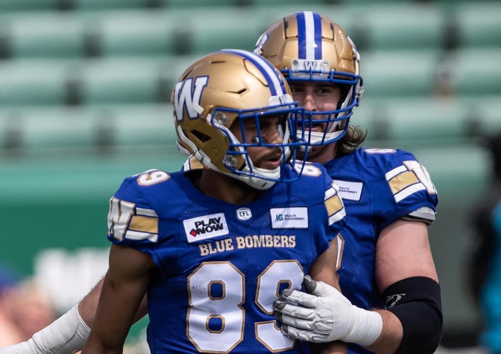Winnipeg Blue Bombers' Kenny Lawler (89) and Geoff Gray (68) celebrate a touchdown against the Edmonton Elks during first half CFL preseason action in Edmonton, Alta., on Saturday May 27, 2023. Kenny Lawler is planning to make up for six weeks of lost time. 