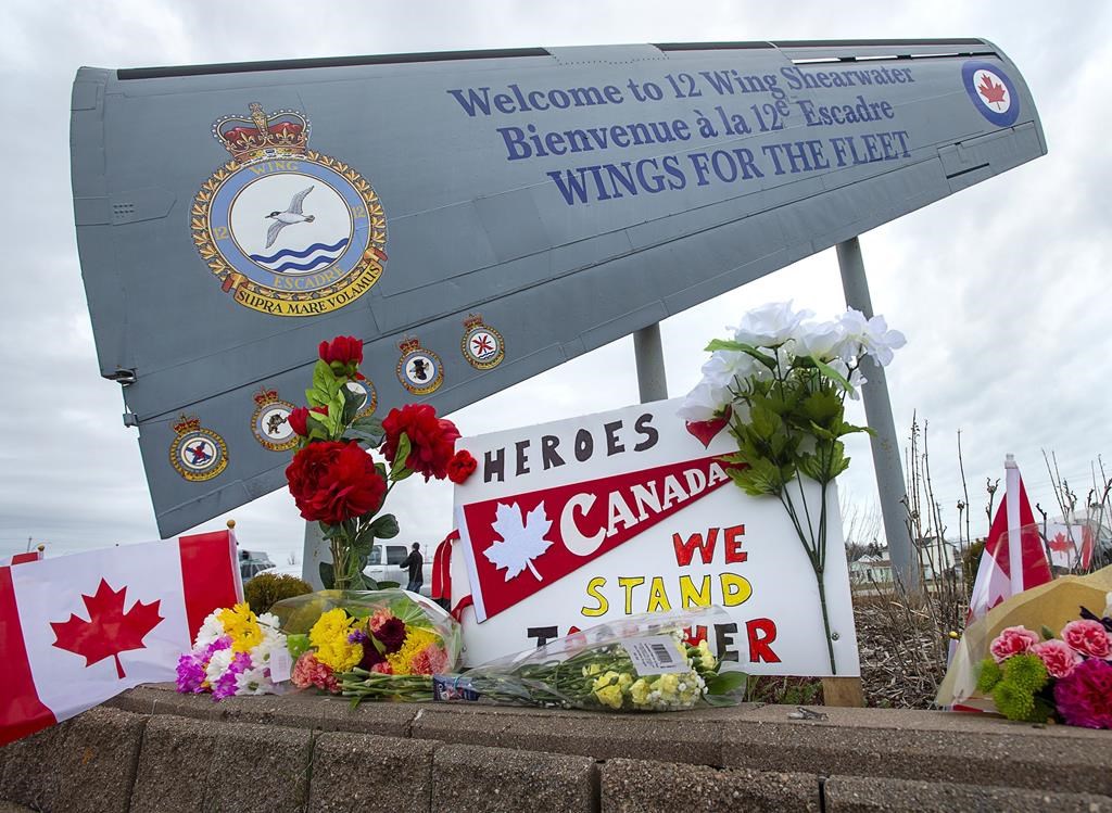 A memorial pays respect to the victims of a military helicopter crash, at 12 Wing Shearwater in Dartmouth, N.S., home of 423 Maritime Helicopter Squadron, on Friday, May 1, 2020. The families of six members of the Canadian Armed Forces who were killed in a "terrifying" helicopter crash in April 2020 are suing the manufacturer.THE CANADIAN PRESS/Andrew Vaughan