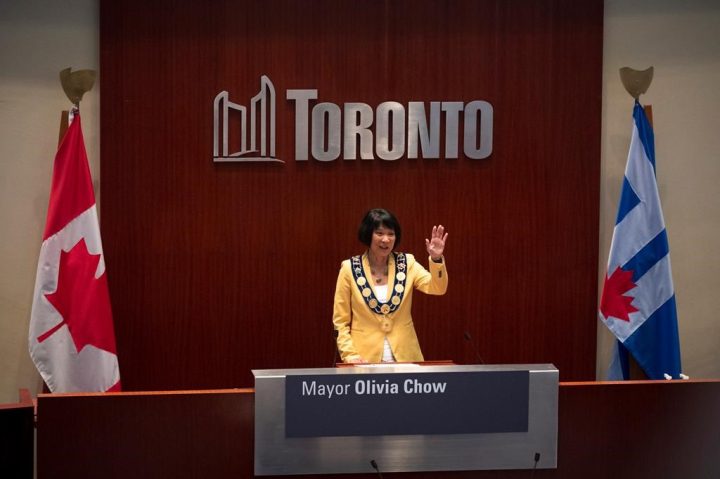 Newly elected Mayor Olivia Chow waves to the crowd at council chambers during her Declaration of Office Ceremony, at Toronto City Hall on July 12, 2023. 