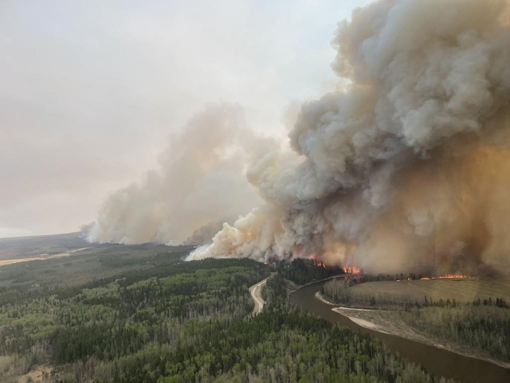 A large wildfire burns. This handout image provided by the Government of Alberta and posted on their social media page.