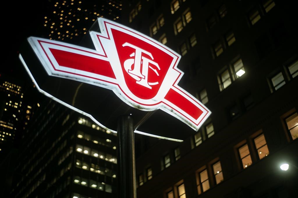 A TTC sign is shown at a downtown Toronto subway stop on Tuesday, Jan. 24, 2023. 