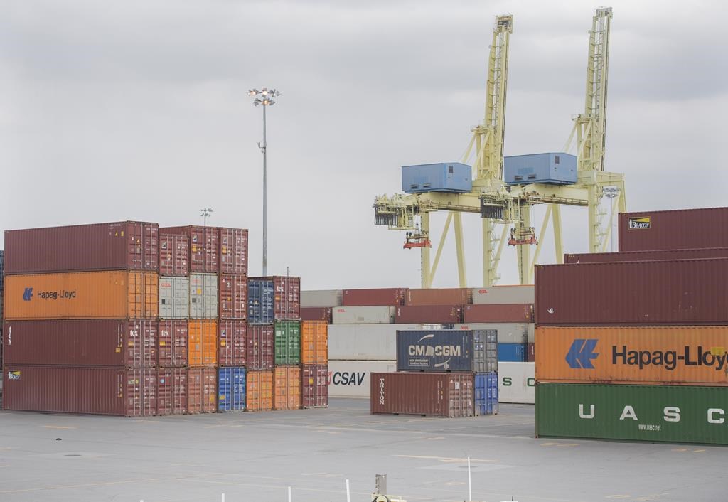 Shipping containers are shown at the Port of Montreal, Sunday, April 25, 2021. THE CANADIAN PRESS/Graham Hughes.