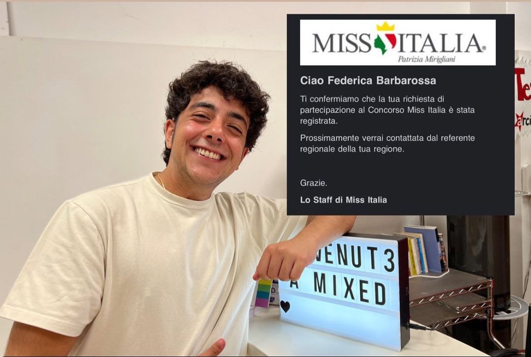 Federico Barbarossa, a trans activist from Italy, poses with a screenshot of an acceptance email for the Miss Italy pageant. 