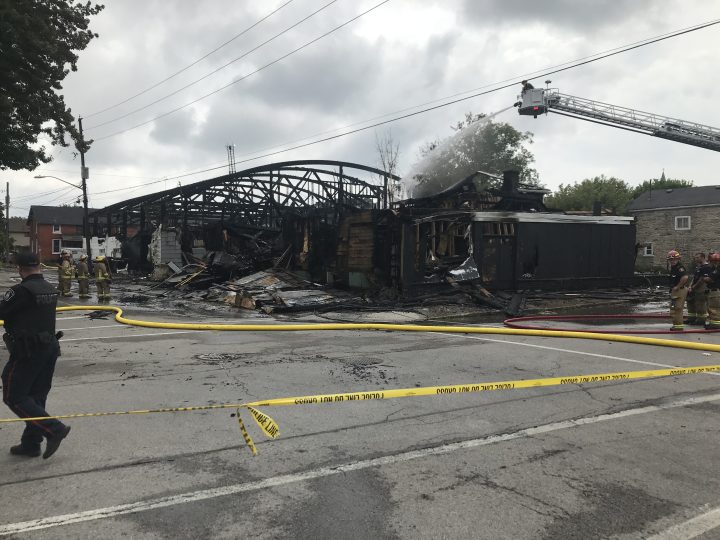 Police say a fire that left an Outlaws biker gang hangout nearly decimated is now being treated as an arson investigation. 