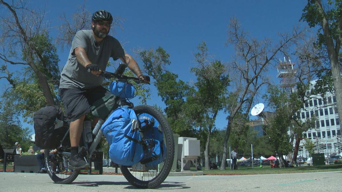Man biking across Canada for mental health awareness stops in Regina - image