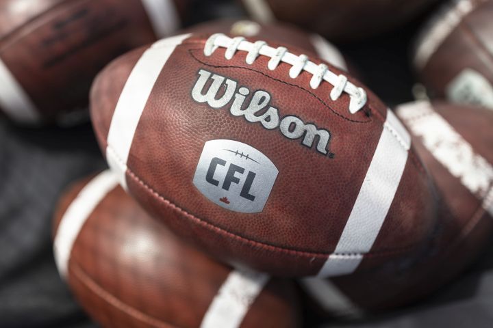 CFL logo seen on a football during the opening day of CFL training camp at Ron Joyce Stadium in Hamilton, Ont., Sunday, May 14, 2023.