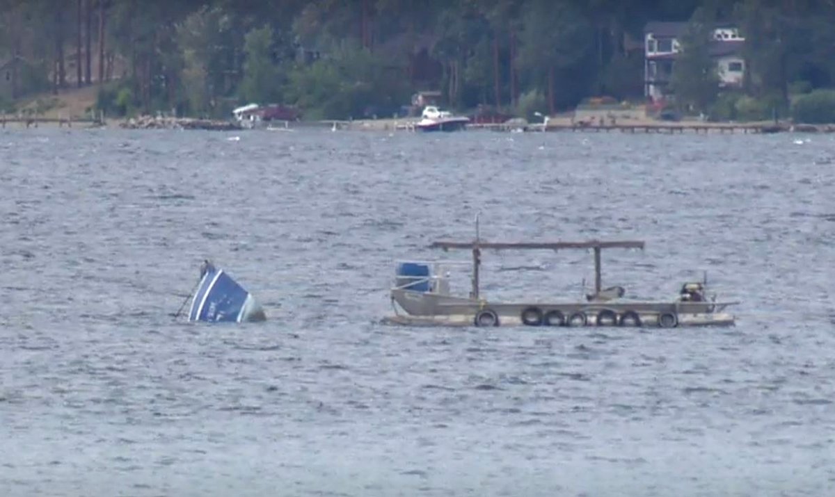 The capsized fishing boat on Okanagan Lake. RCMP said they have had no indication the boat's captain survived, but won't confirm this until he has been located.