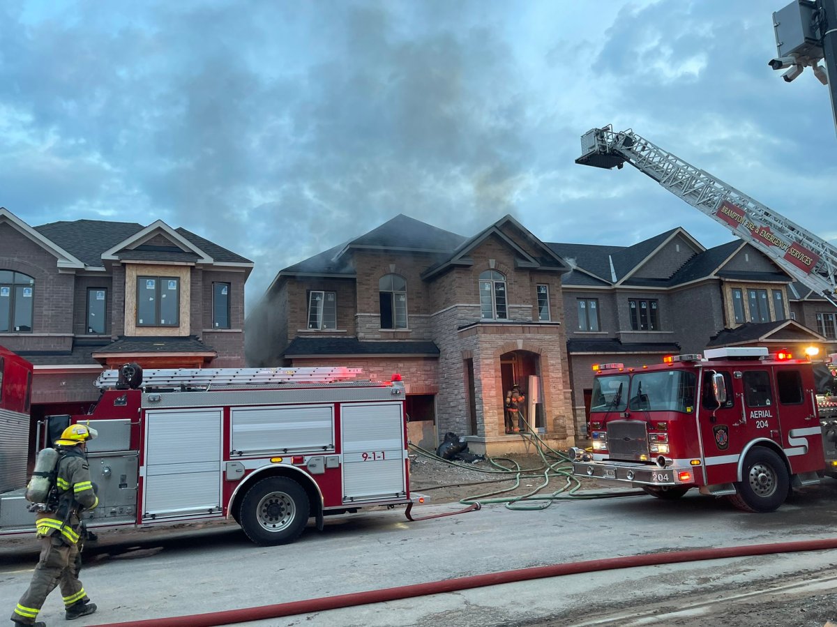 Crews are battling a house fire in Brampton.