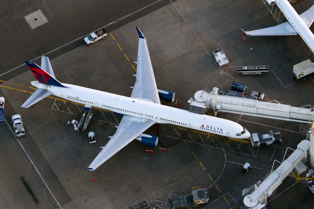 File - A Delta Air Lines Boeing 757-300 parked at the stand at Los Angeles International airport.