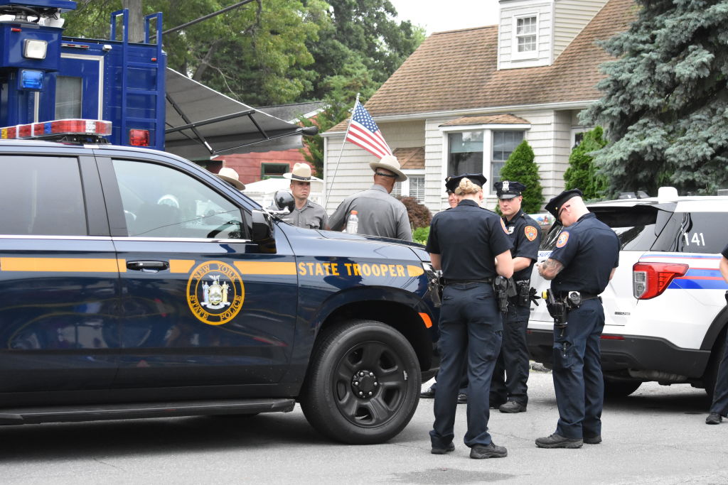Personnel cordon-off the area after a suspect arrested in Gilgo Beach serial killings In Massapequa Park, Long Island, New York on July 14, 2023.