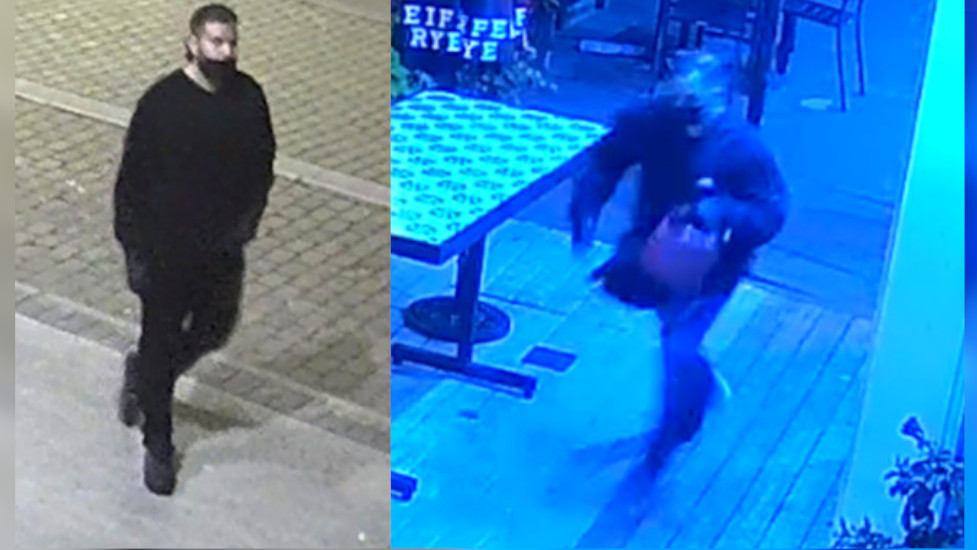 Photo of two arson suspects dressed in dark clothing seen on surveillance video near Hess Street in Hamilton.