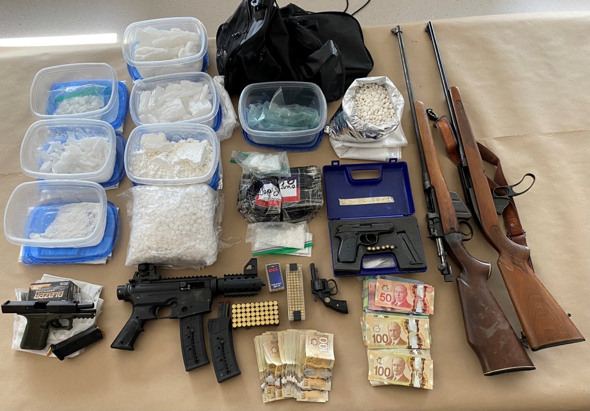 Drugs, weapons, and cash seized by Guelph police after executing search warrant at home.