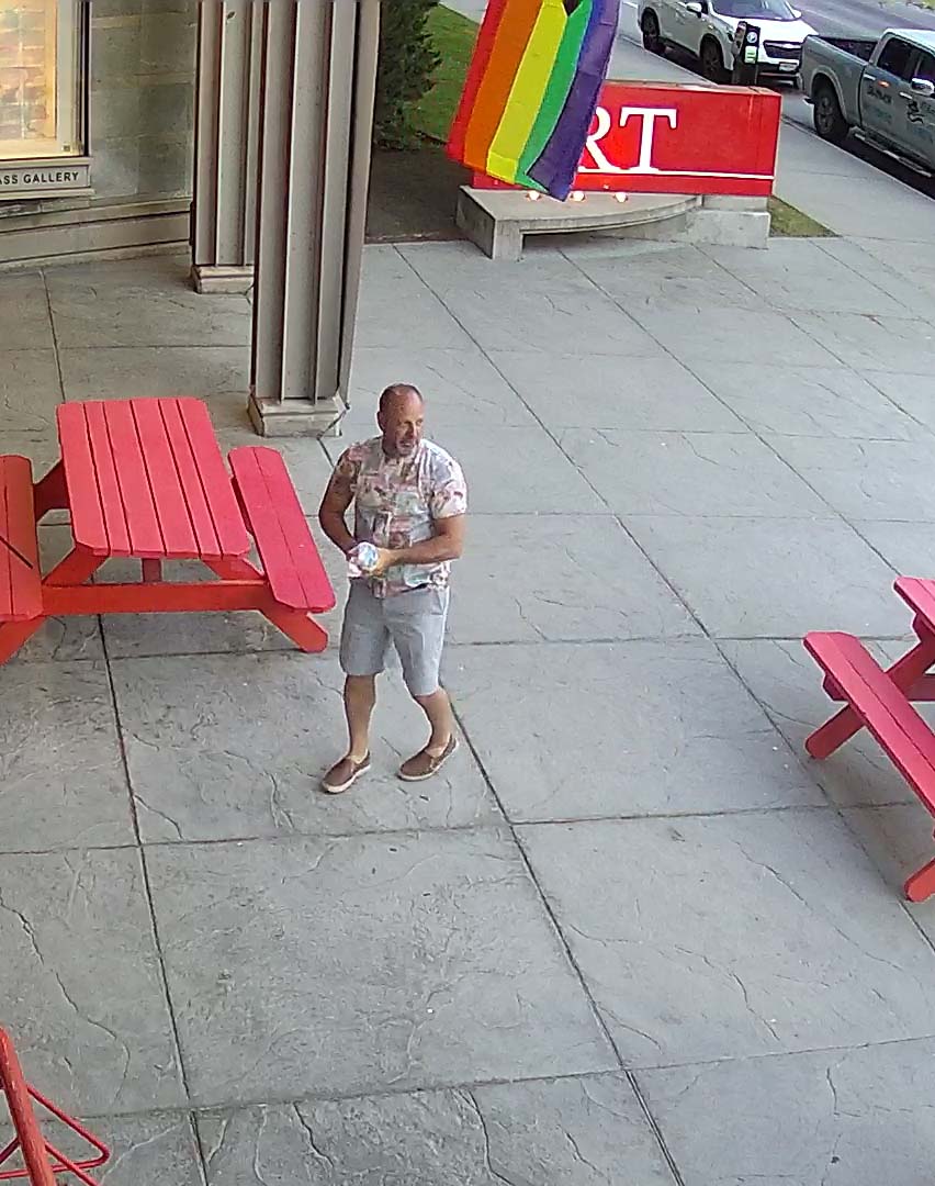 Kelowna RCMP speak to man who ripped down trans flag - image