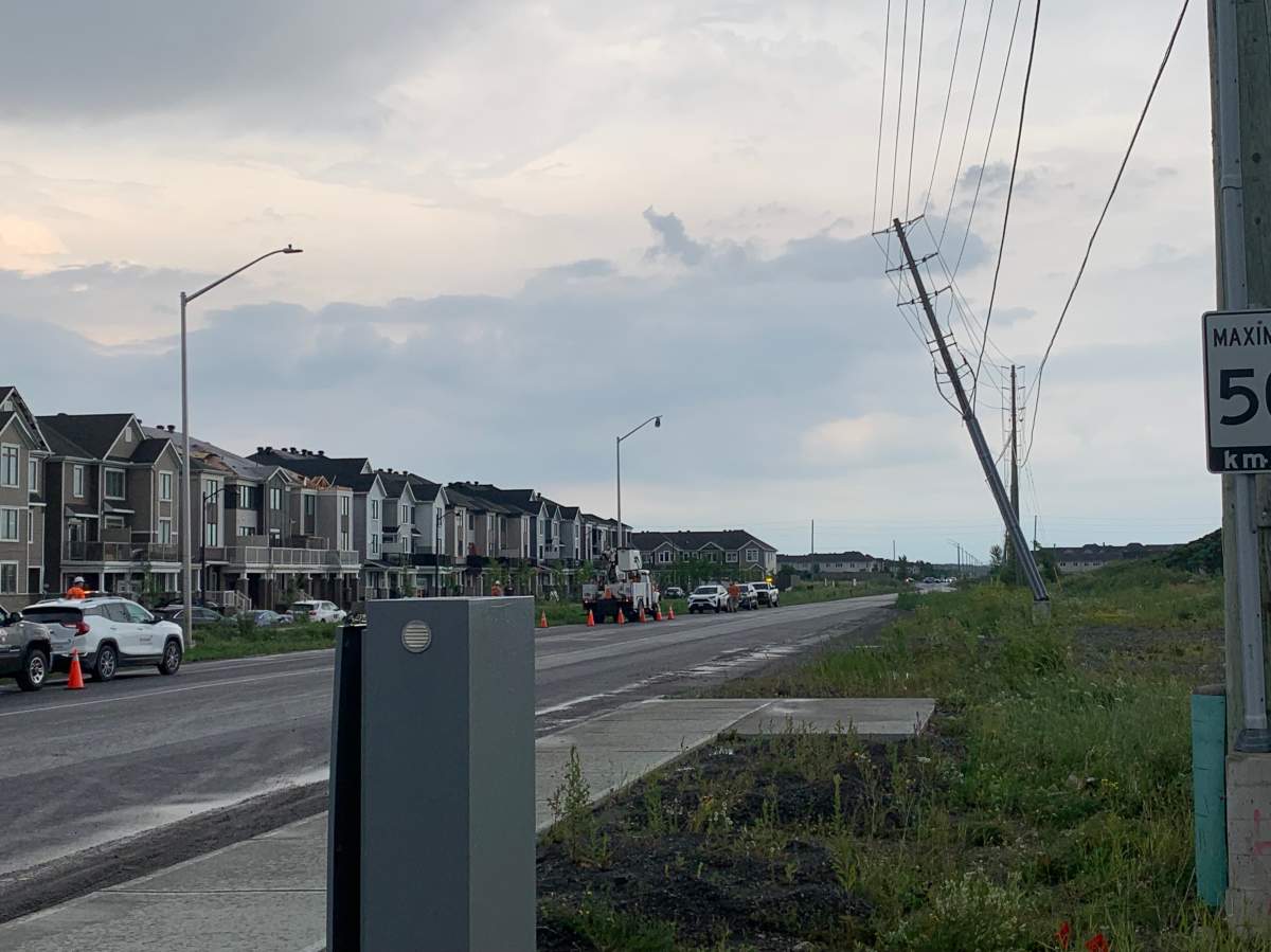 Damaged telephone poles following a tornado in Ottawa suburb Barrhaven. (David Baxter/Global News)