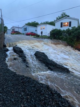 A road in Lakeside's Mini Home Park completely flooded due to the torrential downpour that started in Halifax on Friday.
