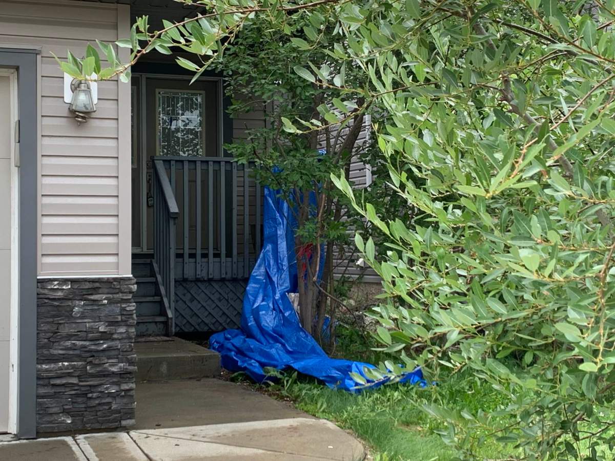 Edmonton police investigate after a man was found dead outside a home near 84 Street and 179 Avenue on Monday, July 10, 2023.