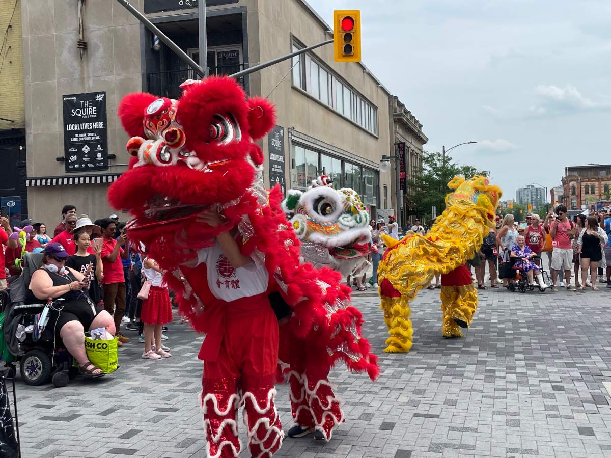 The London Chinese Freemasons Lion Dance Team performs at Dundas Place for Canada Day on July 1, 2023.