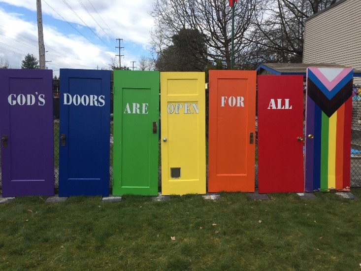 Volunteers at Vancouver's Shaughnessy Heights United Church spent their Saturday repainting pride themed doors that had been vandalized. 
