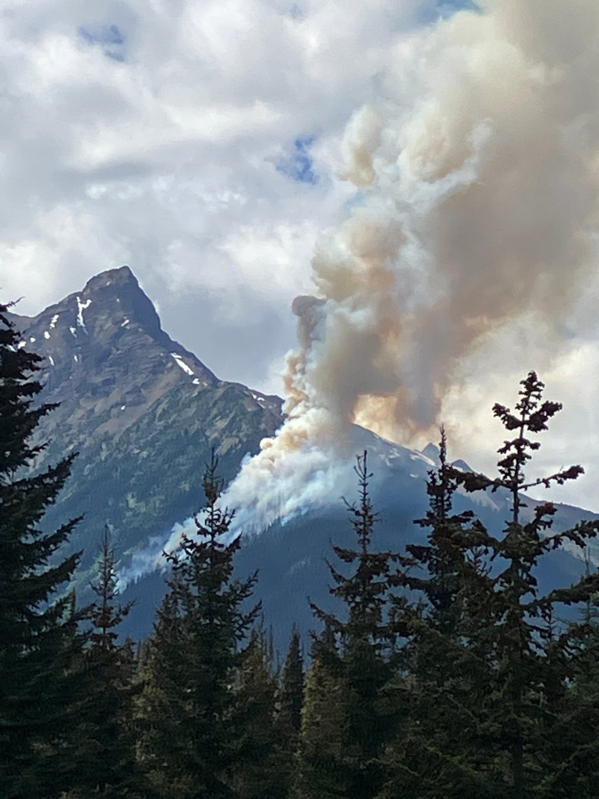 The Sessel Mountain wildfire continues to burn near Pemberton and although it is not threatening any structures or roads, it is highly visible to surrounding communities.