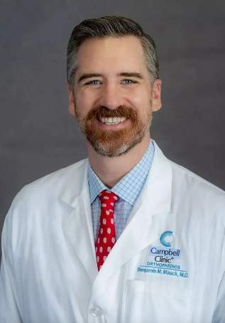 A headshot of Dr. Benjamin Mauck.