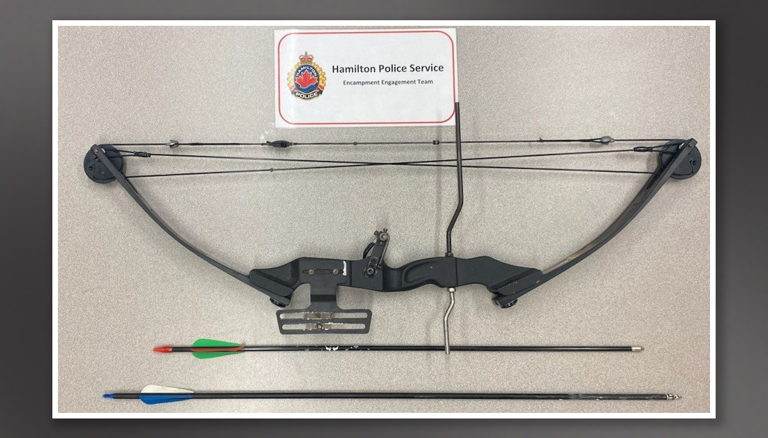 Police say officers on a foot patrol located an illegal archery compound bow and two arrows July 14, 2023 at Woodlands Park in Hamilton.
