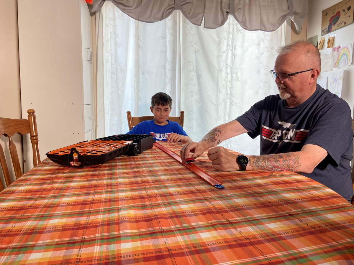 The two love to play Hot Wheels together.