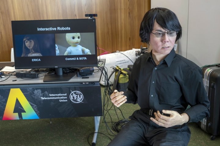 Robots say they won’t rebel against humans as dozens gather at