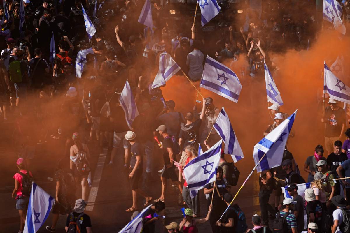 Demonstrators blocking a road during a protest against plans by Prime Minister Benjamin Netanyahu’s government to overhaul the judicial system, in Jerusalem, Monday, July 24, 2023. (AP Photo/Ariel Schalit)