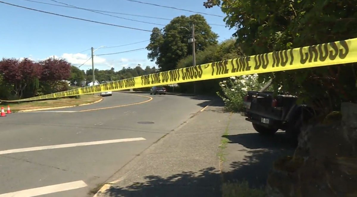 Police tape is seen at the scene of a suspicious death investigation in Oak Bay on Wednesday, July 25, 2023. 