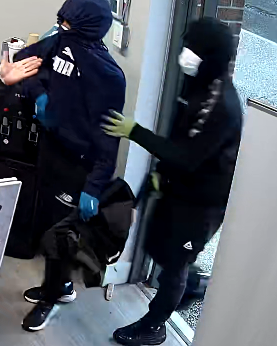 Police in Port Moody are looking for these two men who allegedly pulled a gun and assaulted a worker in an attempted robbery Tuesday morning. 