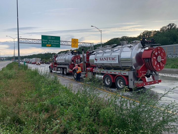 Trucks were called in to help remove pooled water from Highway 20. Thursday, July 13, 2023. Tim Sargeant/ Global News