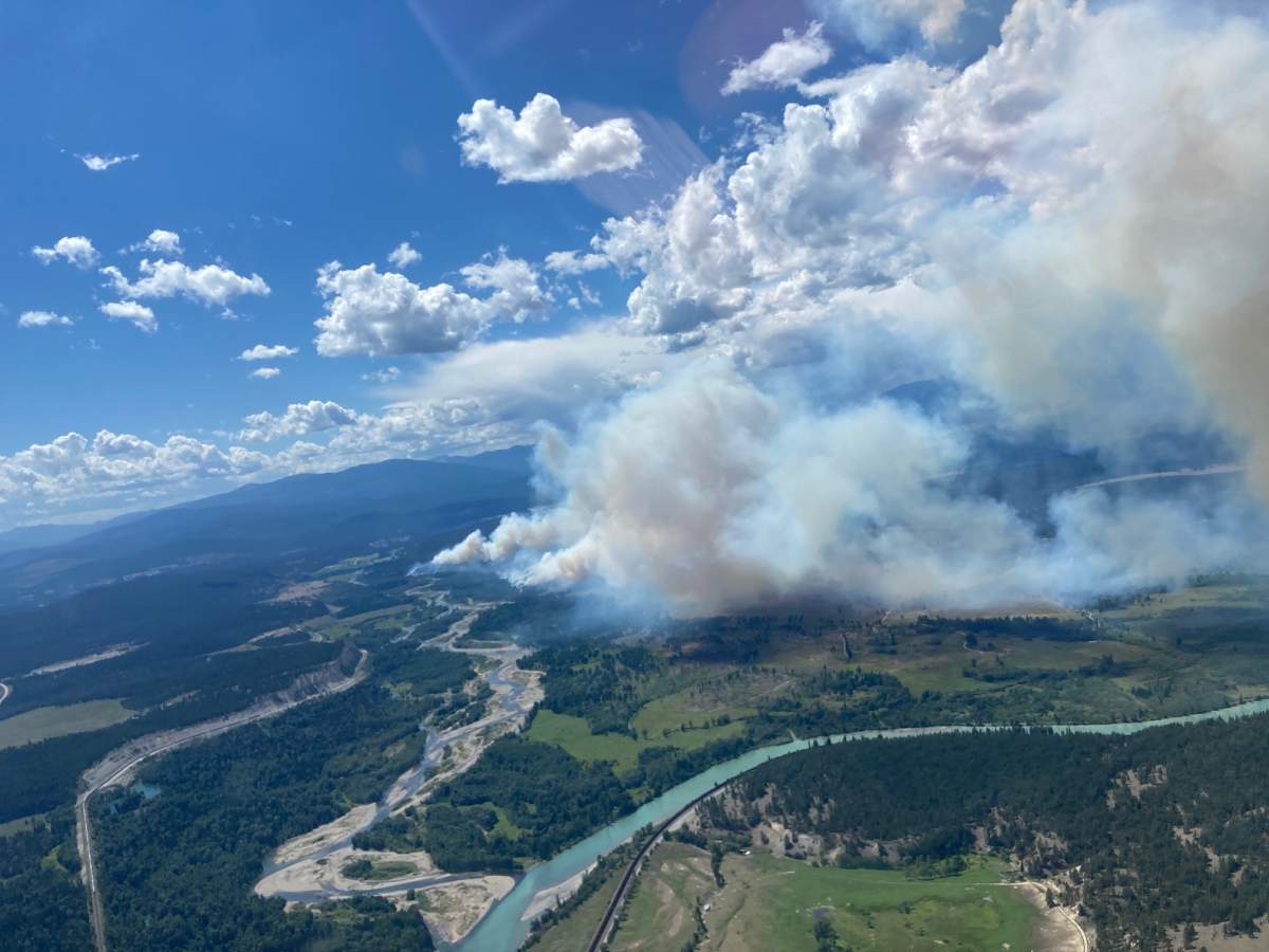 Evacuations, flight cancellations as 300-hectare wildfire burns near Cranbrook - image