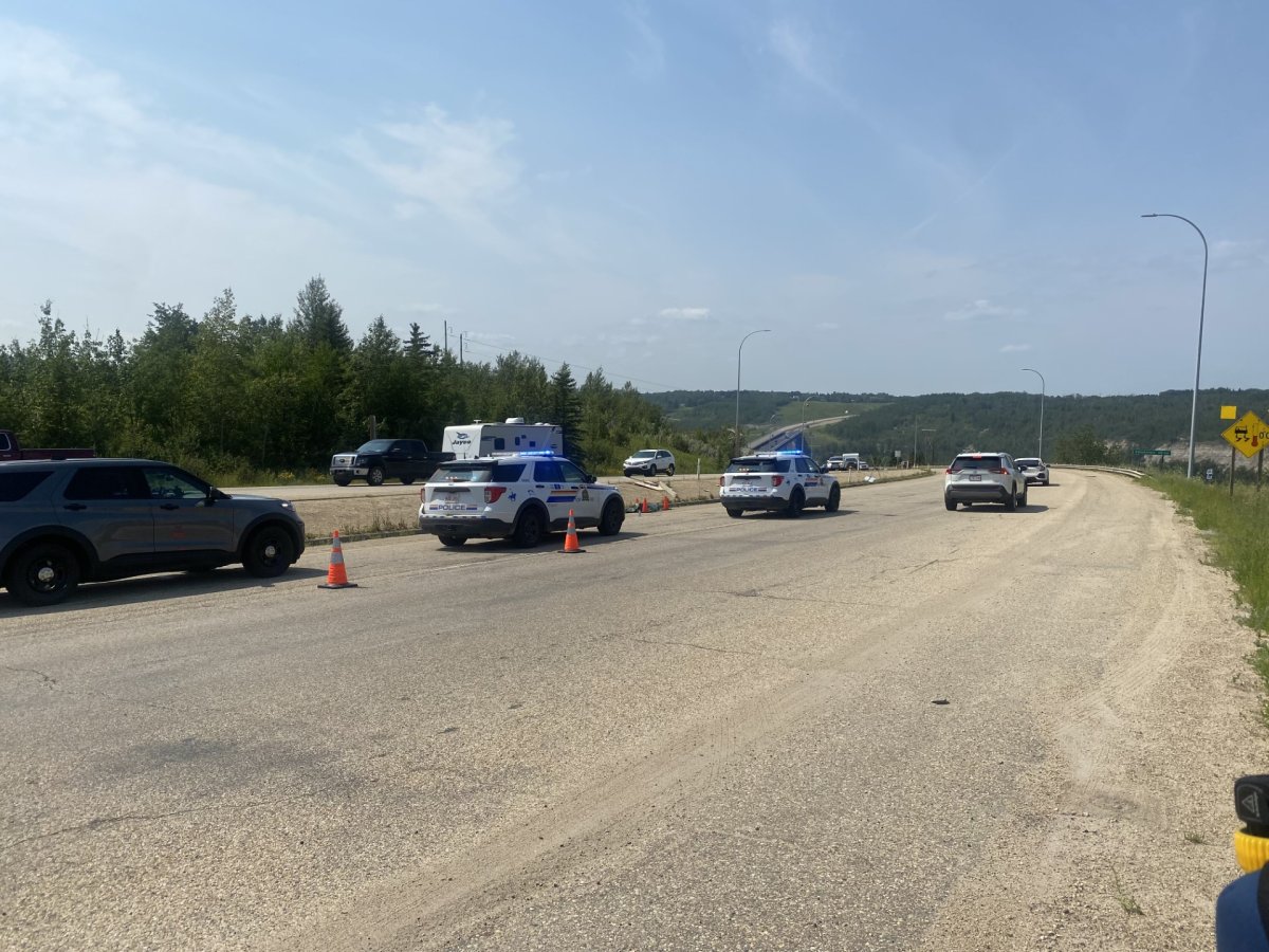 RCMP had an area of Highway 60 near Devon, Alta. blocked off Sunday afternoon after a fatal motorcycle collision, July 23, 2023.