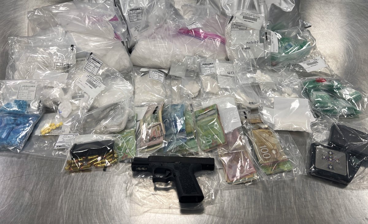 The drugs, cash and handgun seized during an ALERT search warrant in a Calgary home that resulted in Hai Nguyen's arrest.