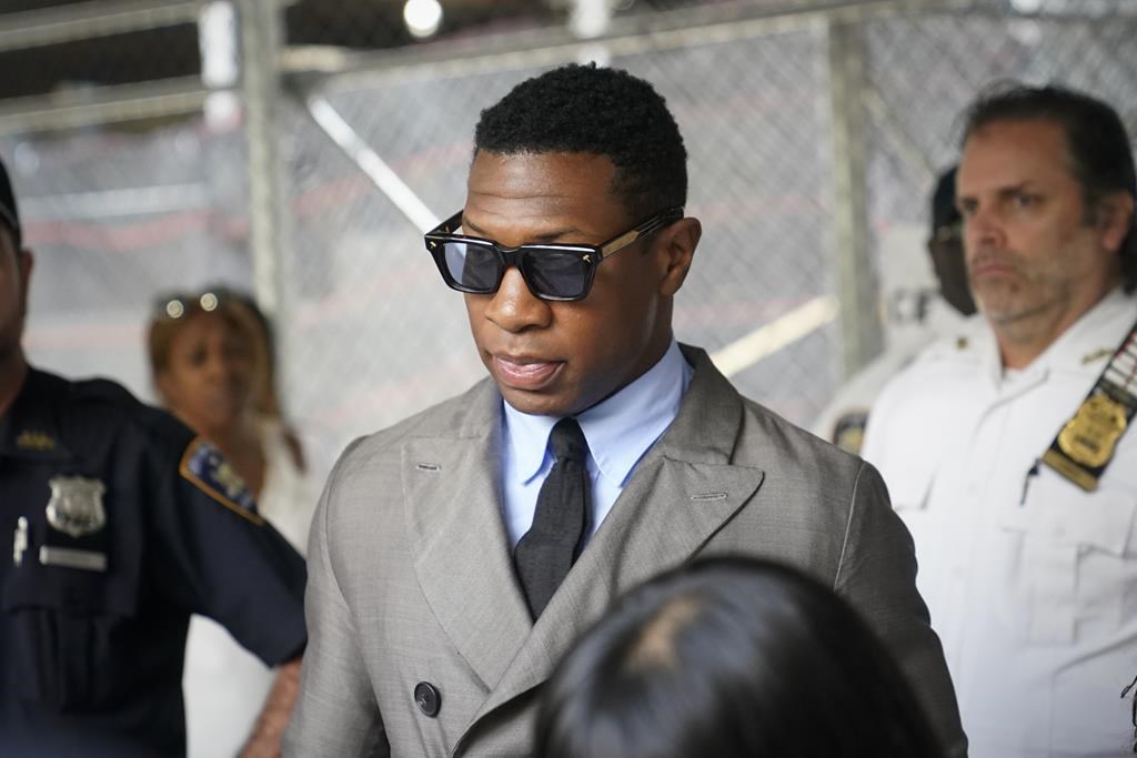 Jonathan Majors leaves court after a hearing on his domestic violence case, Thursday, Aug. 3, 2023, in New York.