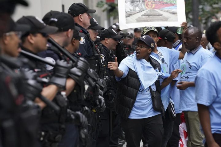Toronto Police work the scene of a protest outside of the Sheraton Hotel in downtown Toronto, on Sunday, August 6 2023. Toronto Police say three people were arrested and later released unconditionally at a protest outside the Sheraton Hotel on Queen St. West.