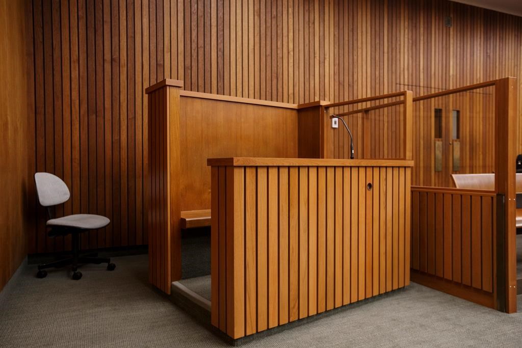 Defendant box in a courtroom at the Edmonton Law Courts building, in Edmonton on Friday, June 28, 2019.