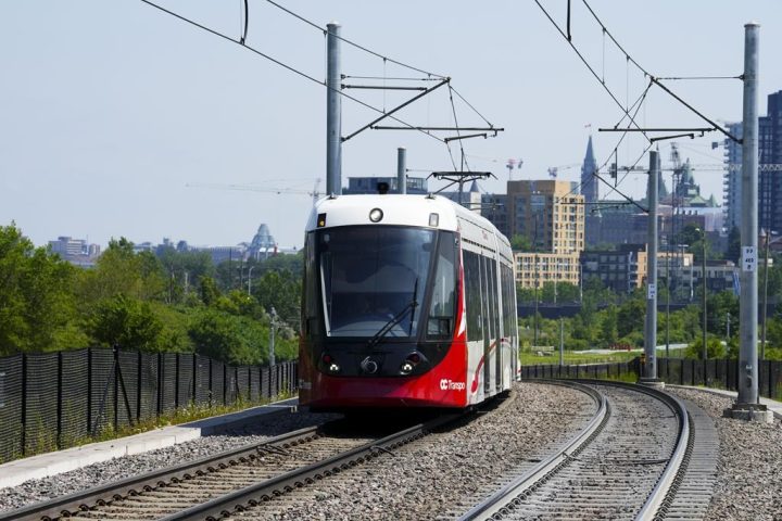 An Ottawa Light Rail Transit (OLRT) train travels along the tracks in Ottawa on Wednesday, June 22, 2022. 