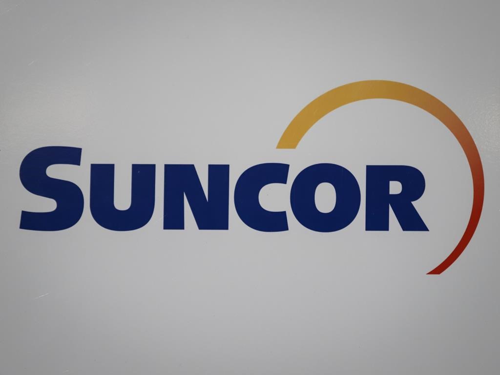 A Suncor logo is shown at the company's annual meeting in Calgary on May 2, 2019.