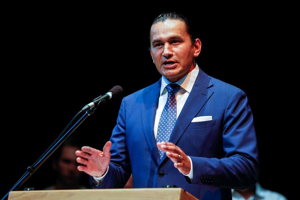 Manitoba's Opposition New Democrats are promising rebates for people who purchase electric vehicles. Wab Kinew, leader of the Manitoba NDP, speaks to party faithful during an event at the Canadian Mennonite University in Winnipeg on Wednesday, Aug. 16, 2023. 