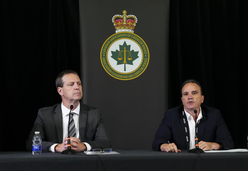 Ottawa Police Service Chief Eric Stubbs, left and Chief Danny Smyth, president of the Canadian Association of Chiefs of Police, hold a press conference during the CACP Summit in Ottawa on Tuesday, Aug. 22, 2023.