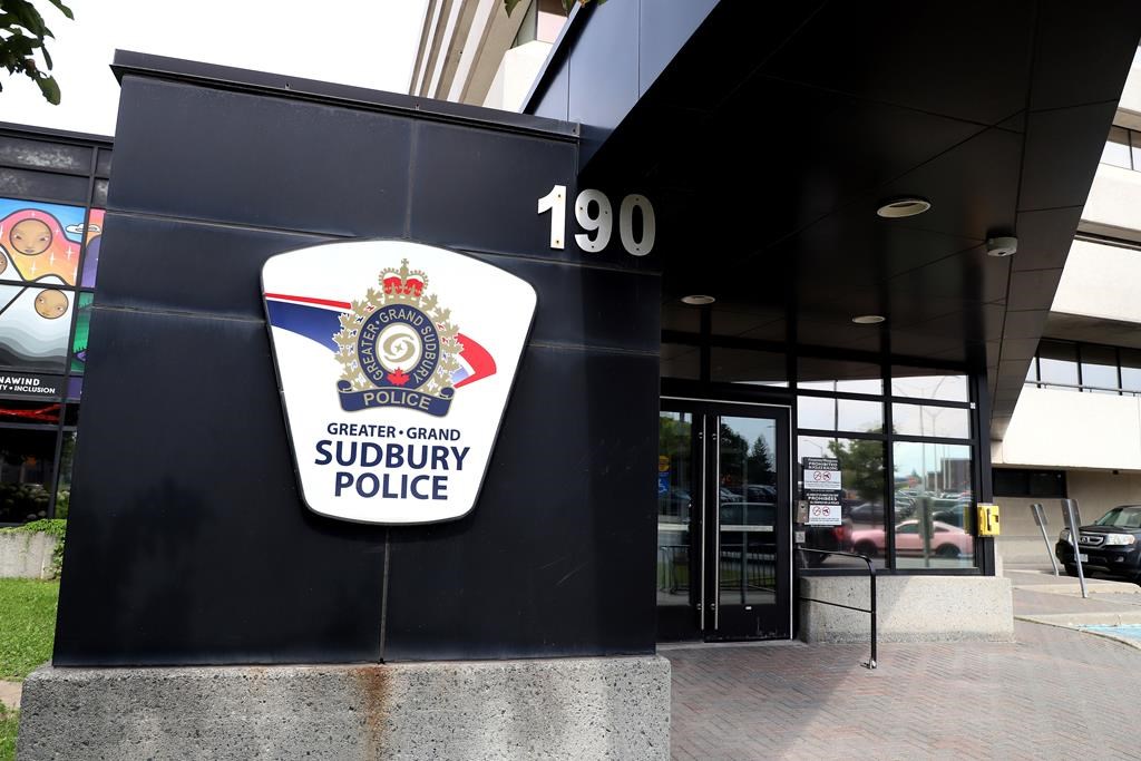 The Sudbury police headquarters are shown in Sudbury, Ont., Wednesday, Aug. 9, 2023. A man has been arrested after allegedly throwing another man in front of traffic in Sudbury in what police believe was a hate-motivated attack. THE CANADIAN PRESS/Gino Donato.