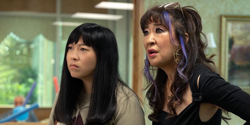 Sandra Oh, right and Awkwafina shown in this still from the film "Quiz lady," play against type in this comedy about two sisters who have to pay off their mother's gambling debts. THE CANADIAN PRESS/HO-TIFF *MANDATORY CREDIT*.