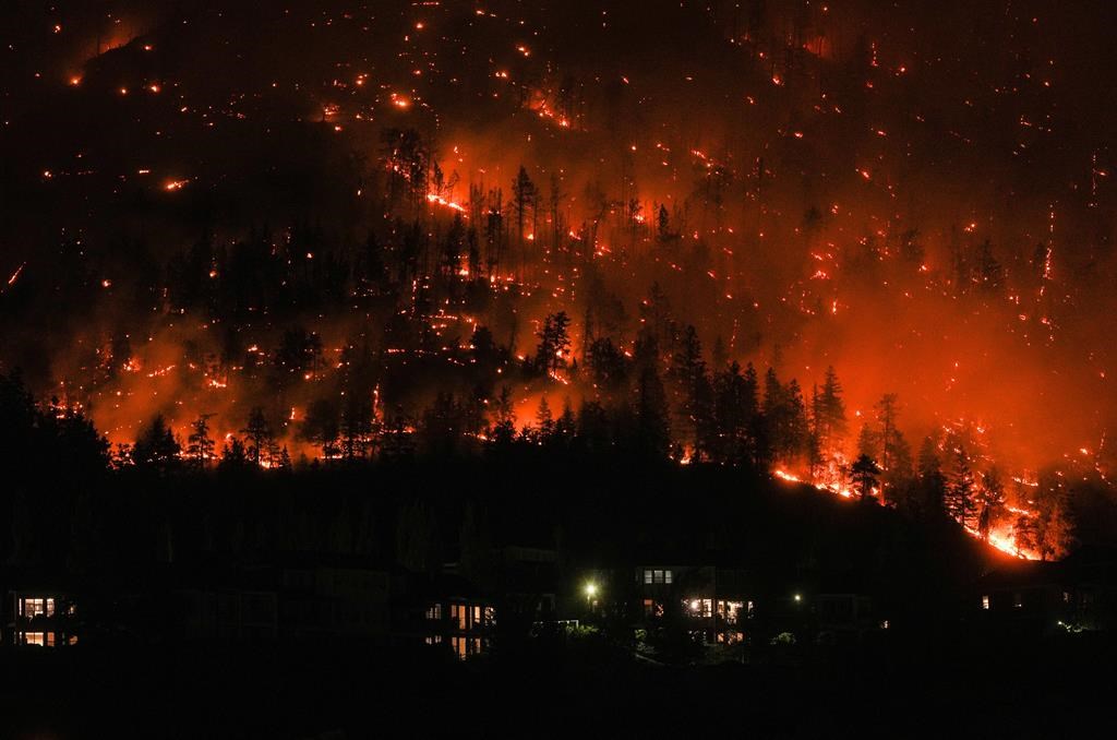 File photo of the McDougall Creek wildfire burning in West Kelowna, B.C., on Friday, August 18, 2023.