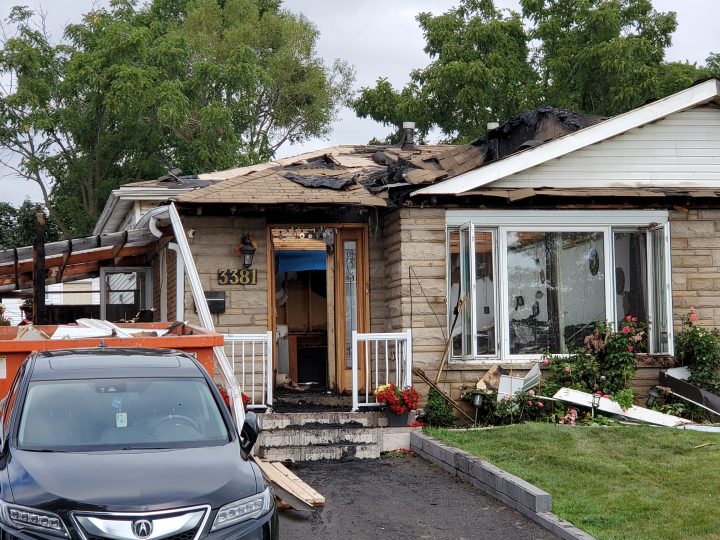The scene of a house fire on Oakglade Crescent in Mississauga Wednesday morning.