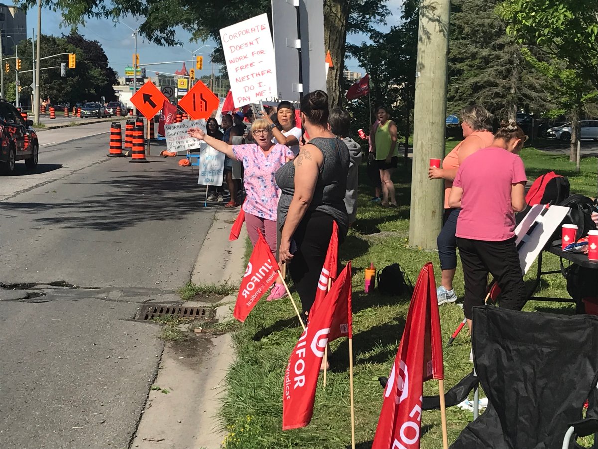 Workers from Extendicare Kingston have started an information picket line because they say they haven't been paid properly in months.
