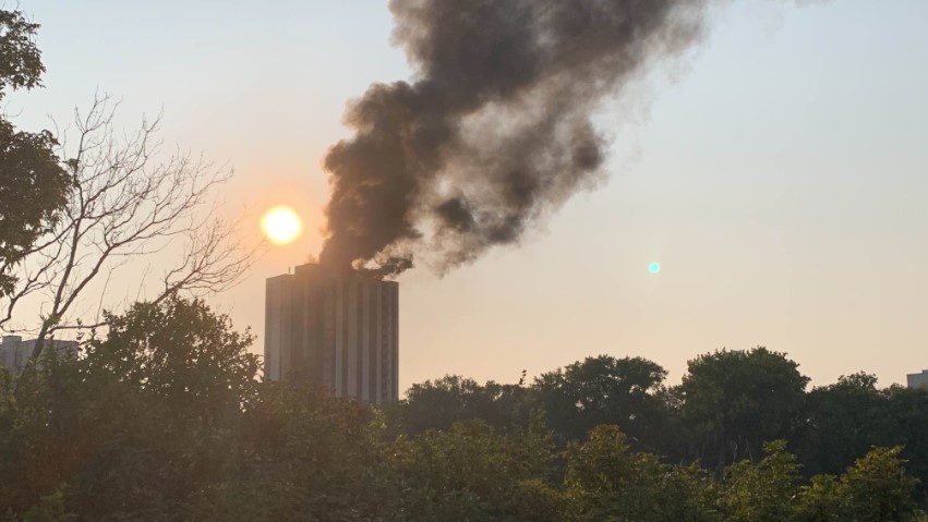 Smoke rising from an apartment building in the River-Osborne area.
