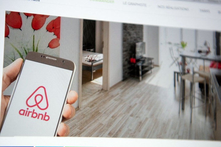 File photo dated June 10 2020 of the logo of the Airbnb platform seen on the screen of a smartphone . 